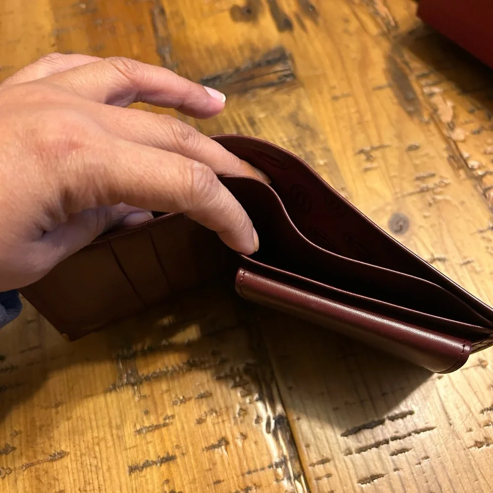 Cartier Deep Burgundy Leather bifold Gold Corner Hardware